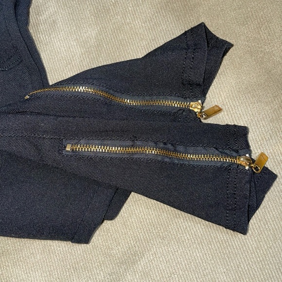 Black jegging size large. Textured and zipper bottoms. Cute with heels. - Picture 6 of 6